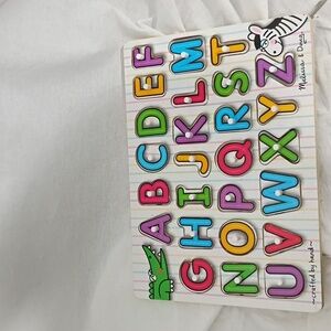 Melissa & Doug Wooden Alphabet Peg Puzzle With Pictures Below Letters, 3+
